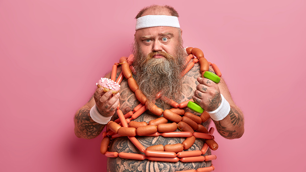 A person eating donuts